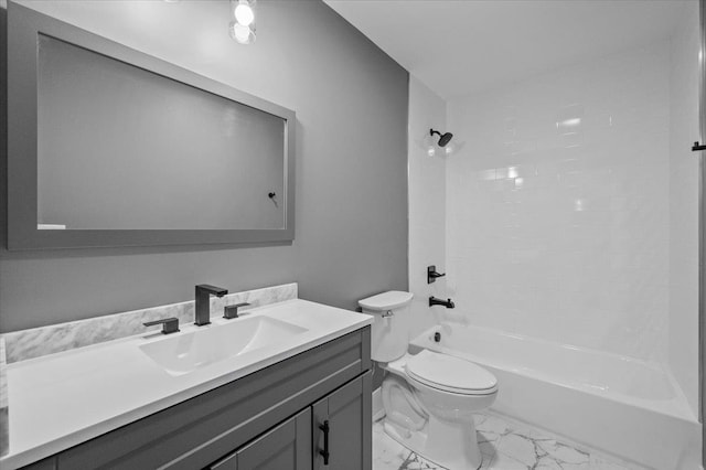 full bathroom with bathtub / shower combination, vanity, and toilet