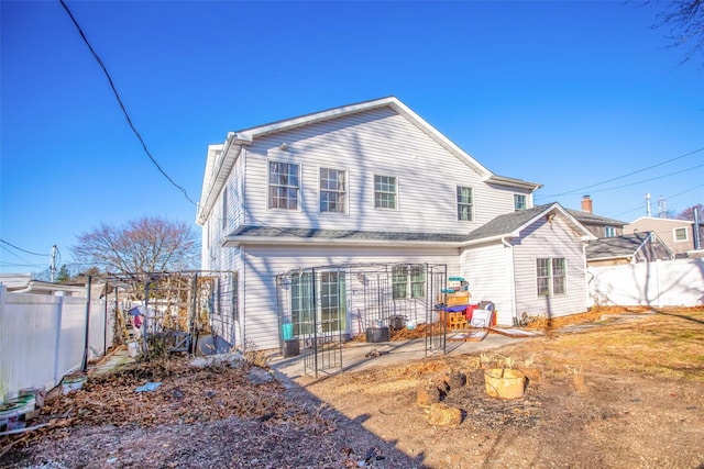 rear view of house with a patio area