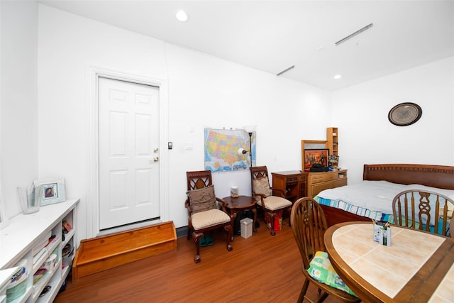 bedroom featuring hardwood / wood-style floors