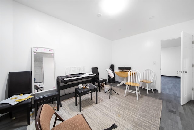 home office with hardwood / wood-style flooring