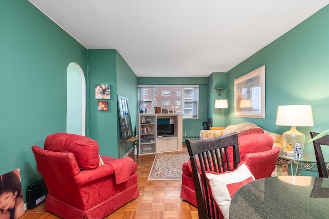 living room featuring light parquet flooring