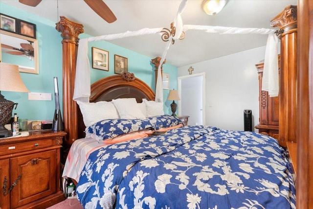 bedroom featuring ceiling fan and carpet