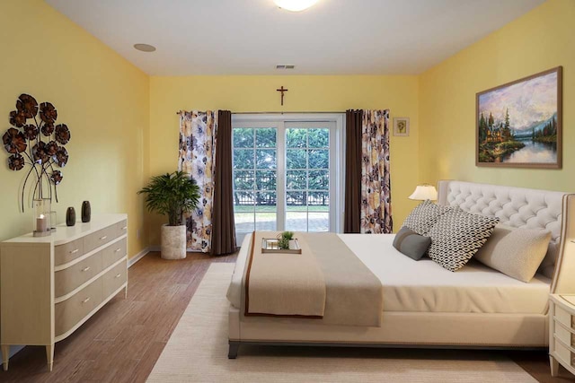 bedroom featuring wood-type flooring