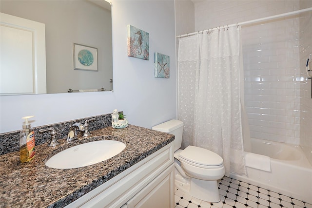 full bathroom with tile patterned flooring, shower / tub combo, vanity, and toilet