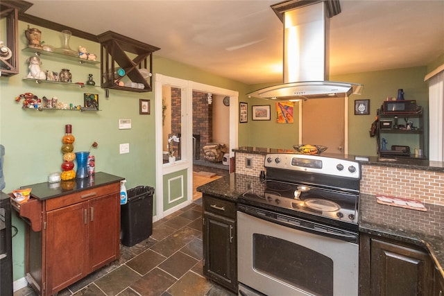 kitchen with stainless steel electric stove, backsplash, dark stone countertops, and island exhaust hood