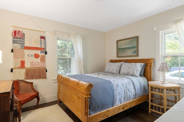 bedroom featuring multiple windows