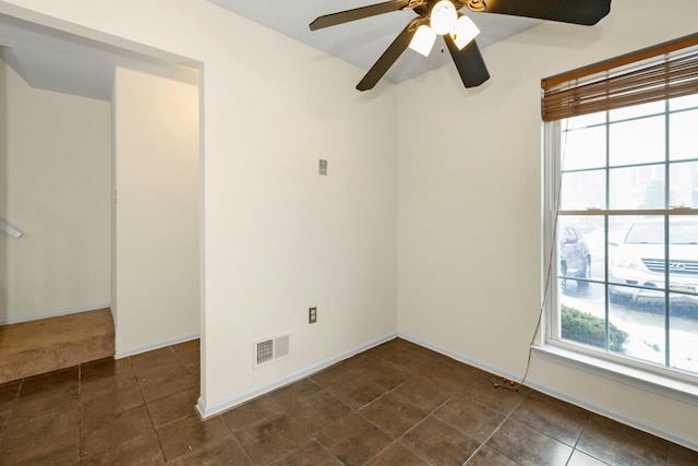 spare room featuring ceiling fan