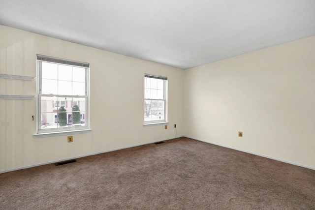 view of carpeted spare room