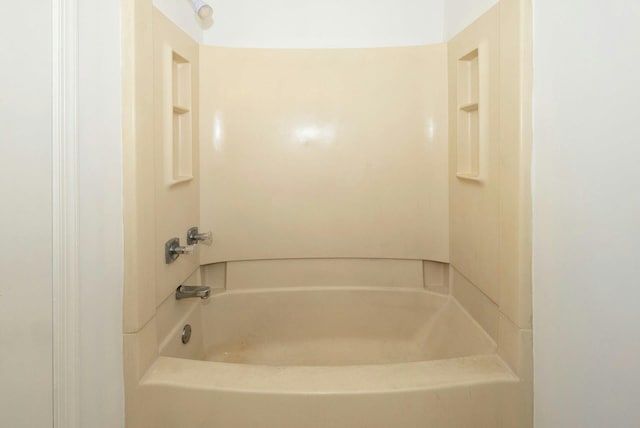 bathroom featuring shower / washtub combination