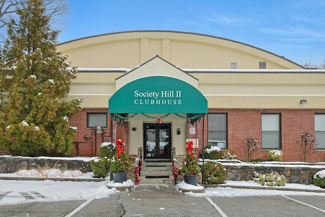 view of snow covered building