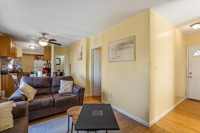 135-07 223rd St, Laurelton, NY 11413 - living room featuring light wood-style floors and ceiling fan