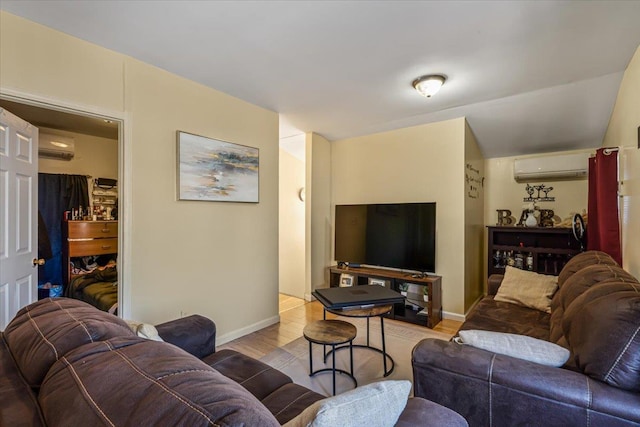 135-07 223rd St, Laurelton, NY 11413 - living room featuring a wall unit AC and wood finished floors