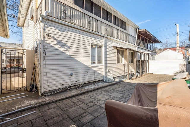 135-07 223rd St, Laurelton, NY 11413 - rear view of property with a patio and a balcony
