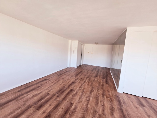 unfurnished room featuring hardwood / wood-style floors