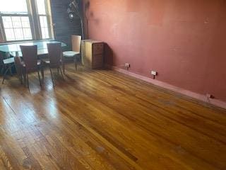 unfurnished dining area with hardwood / wood-style floors