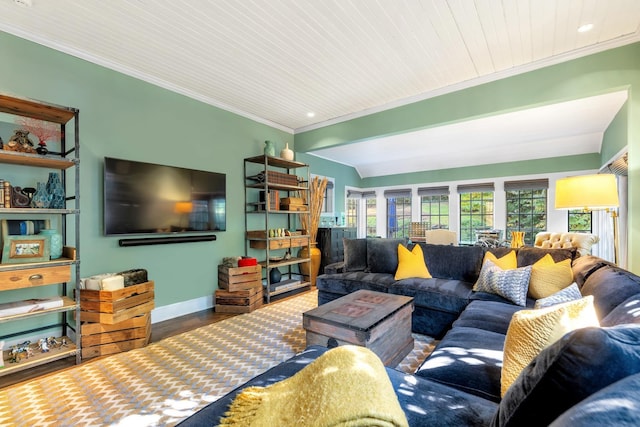 living room featuring crown molding and hardwood / wood-style flooring