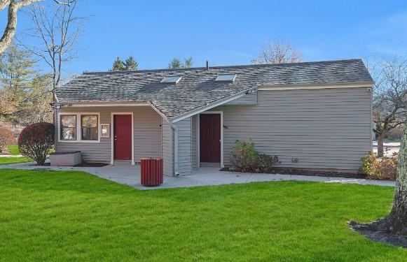 exterior space with a patio area and a front yard