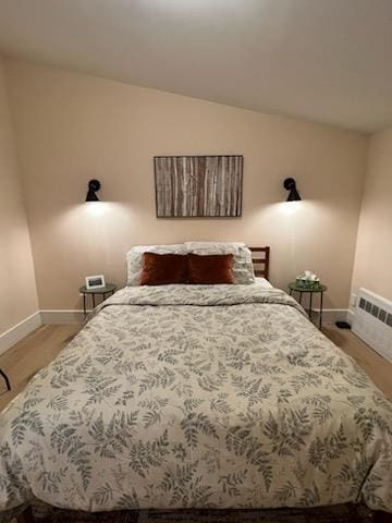 bedroom featuring light wood-type flooring