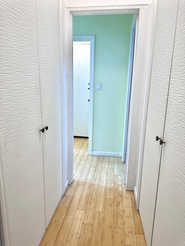 corridor featuring light wood-type flooring