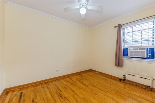 spare room with ceiling fan, a baseboard radiator, light hardwood / wood-style flooring, cooling unit, and ornamental molding