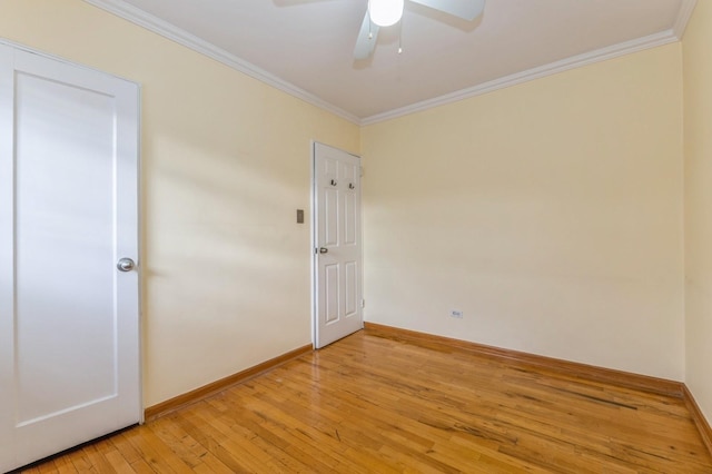 spare room with ceiling fan, light hardwood / wood-style floors, and crown molding