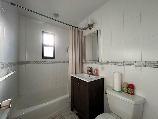 full bathroom featuring vanity, shower / bath combo, tile walls, and toilet