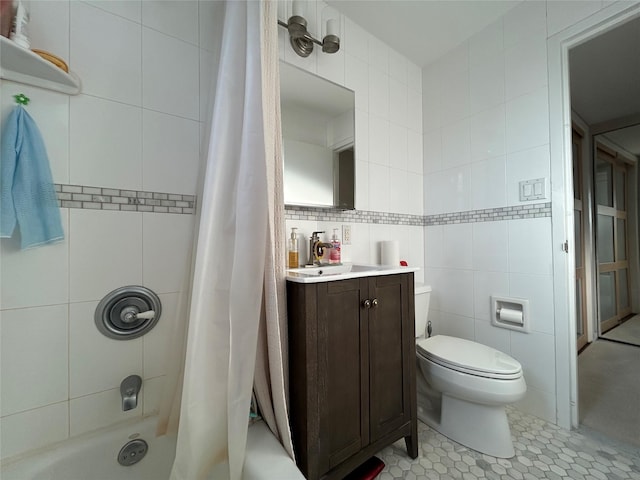 full bathroom featuring toilet, shower / bathtub combination with curtain, tile patterned floors, and tile walls