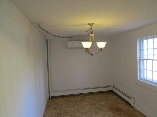 spare room featuring a wall mounted AC, parquet floors, a baseboard radiator, and an inviting chandelier