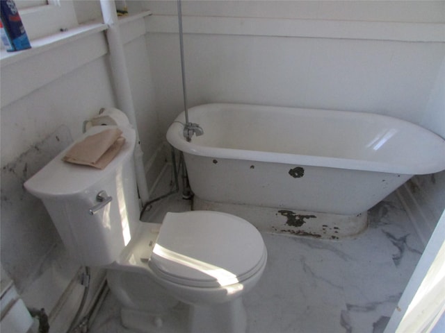 bathroom with a bathtub and toilet