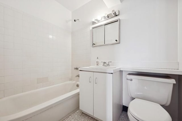 full bathroom featuring vanity, toilet, tile patterned flooring, and tiled shower / bath combo