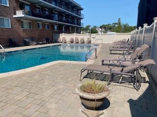 view of pool with a patio