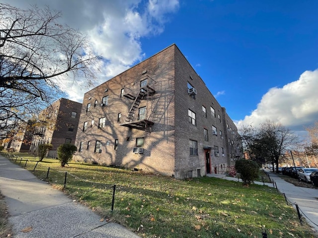 view of building exterior featuring cooling unit