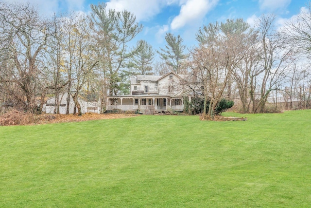 view of yard with a porch