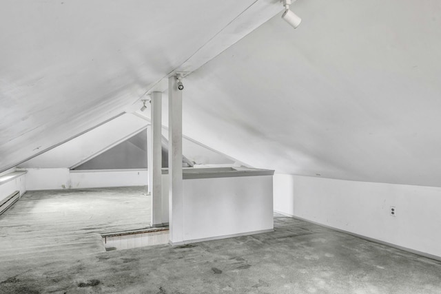 bonus room with carpet flooring and lofted ceiling