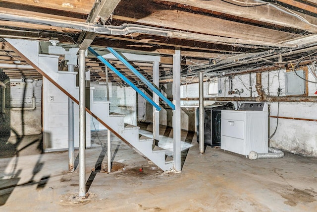 basement with separate washer and dryer