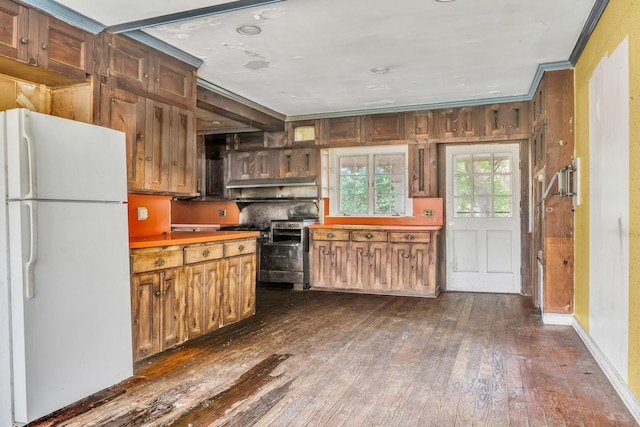 kitchen with electric range, white fridge, dark hardwood / wood-style floors, and crown molding