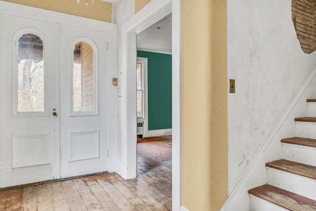 entryway with light hardwood / wood-style floors