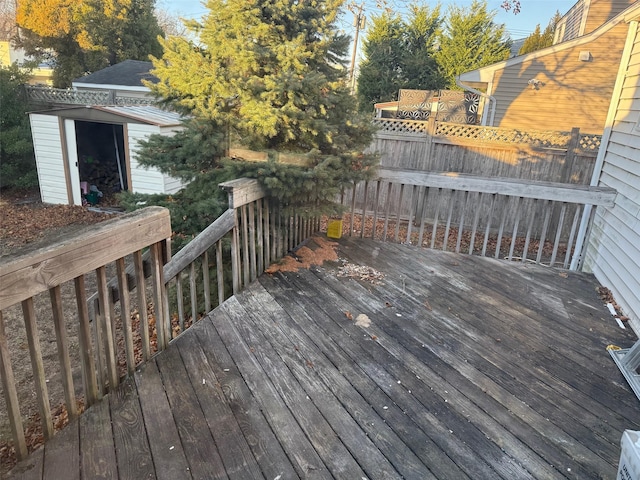 deck featuring a shed