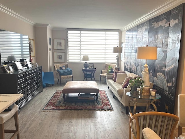 living room featuring crown molding and hardwood / wood-style flooring