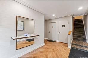 entryway with parquet flooring