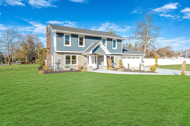 view of front facade with a front yard and a garage