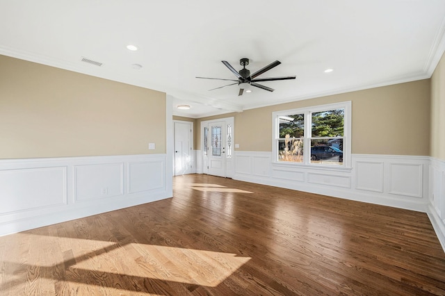 unfurnished room with ceiling fan, hardwood / wood-style floors, and ornamental molding