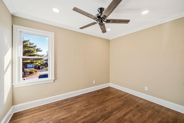 empty room with hardwood / wood-style floors, ceiling fan, and crown molding