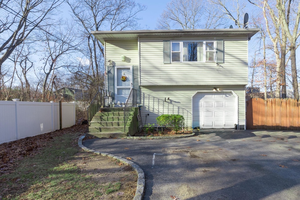 view of front of home with a garage