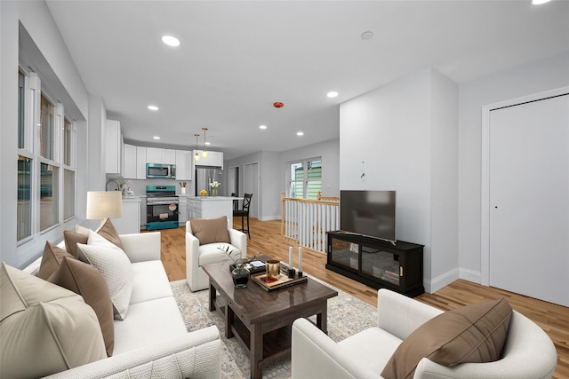 living room featuring light hardwood / wood-style flooring