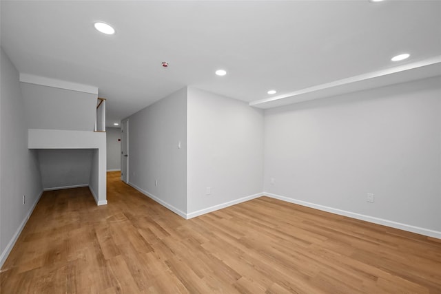 bonus room with light hardwood / wood-style flooring