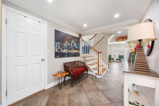 entryway featuring ornamental molding