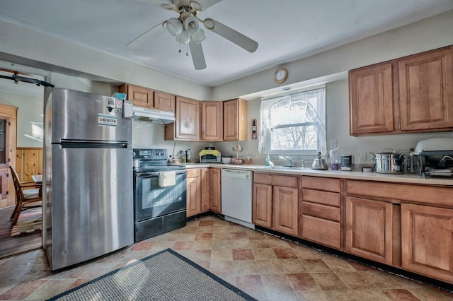 kitchen featuring stainless steel refrigerator, sink, ceiling fan, white dishwasher, and black range with electric cooktop