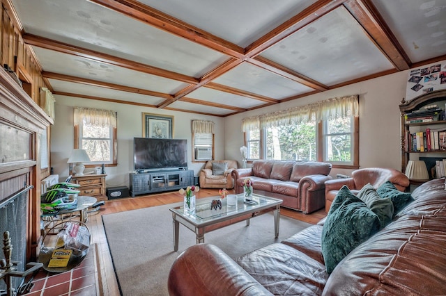 living room with hardwood / wood-style flooring, coffered ceiling, and beamed ceiling