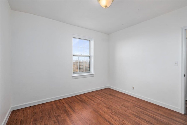 unfurnished room featuring wood-type flooring